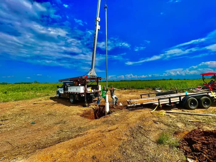 B-E Waterwell drilling rig on site in the Houston area